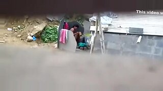 beautifuindian mother bathing with son