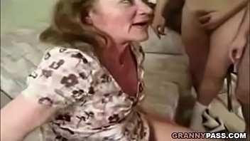 older woman sucks and fucks two young studs