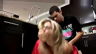 julia ann with her step son in a kitchen