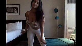 beautiful ts strip and plays with her cock then performs a blowjob